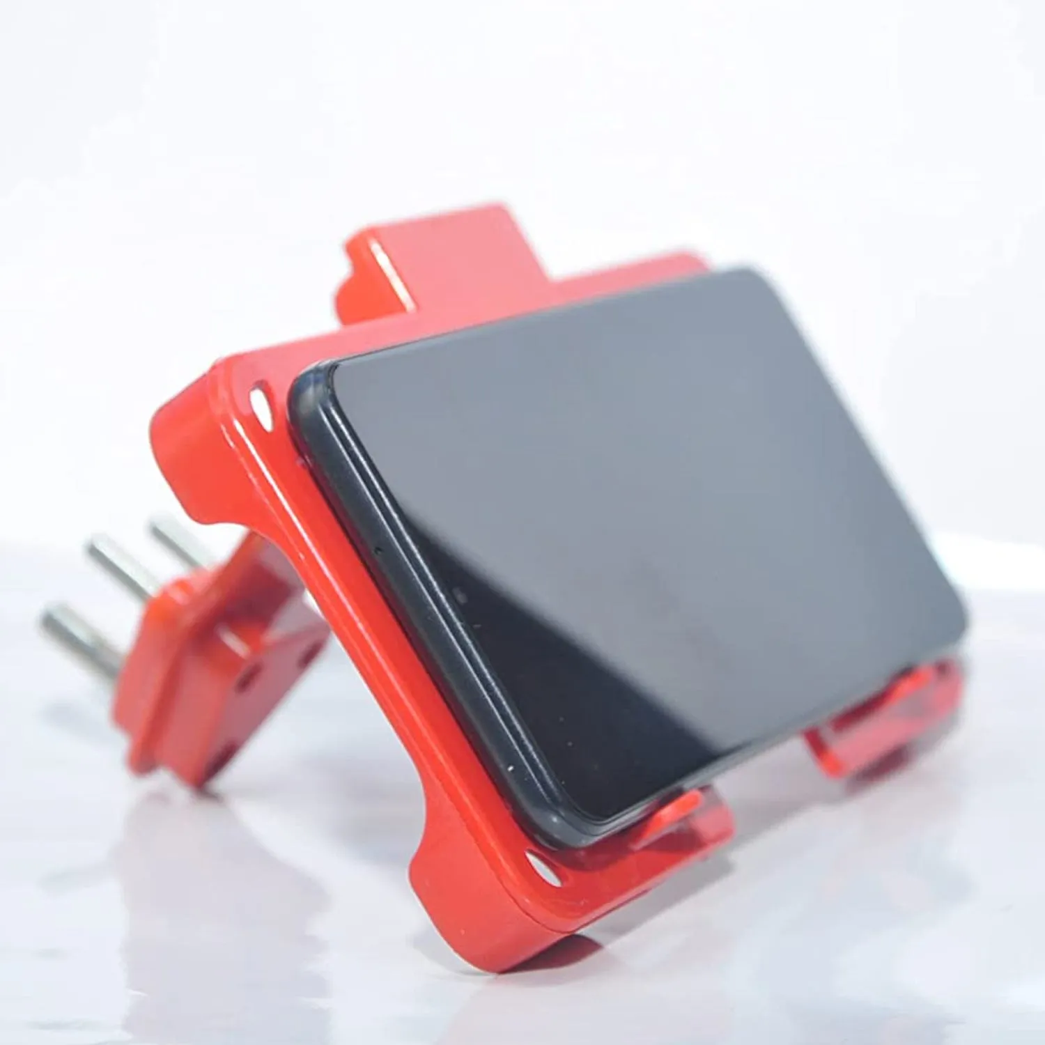 Multi-Purpose Wall Holder Stand for Charging Mobile Just Fit in Socket and Hang (Red)